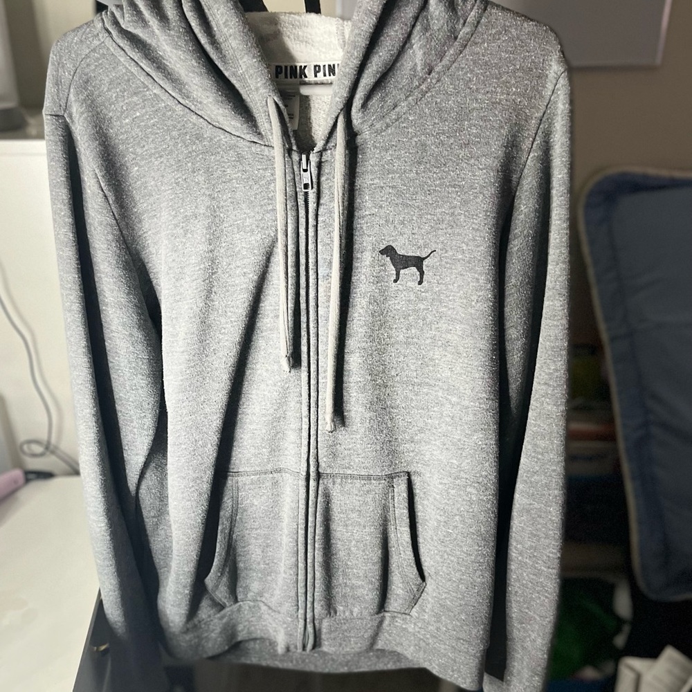 Zip up sweater.